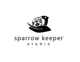 Nro 32 kilpailuun I need a logo done for a kids film studio called Sparrow Keeper Studios.
The logo should feature a small, sweet sparrow being held in a human hand, preferably a child’s hand. It needs to include the name as well. käyttäjältä alaa707
