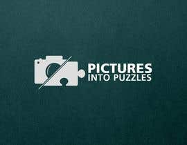 #447 dla Logo Design required for a company called &quot;Pictures into Puzzles&quot; przez drelays