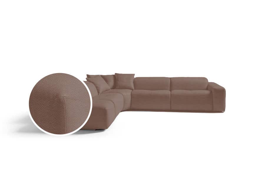 a brown couch with a speaker in front of it