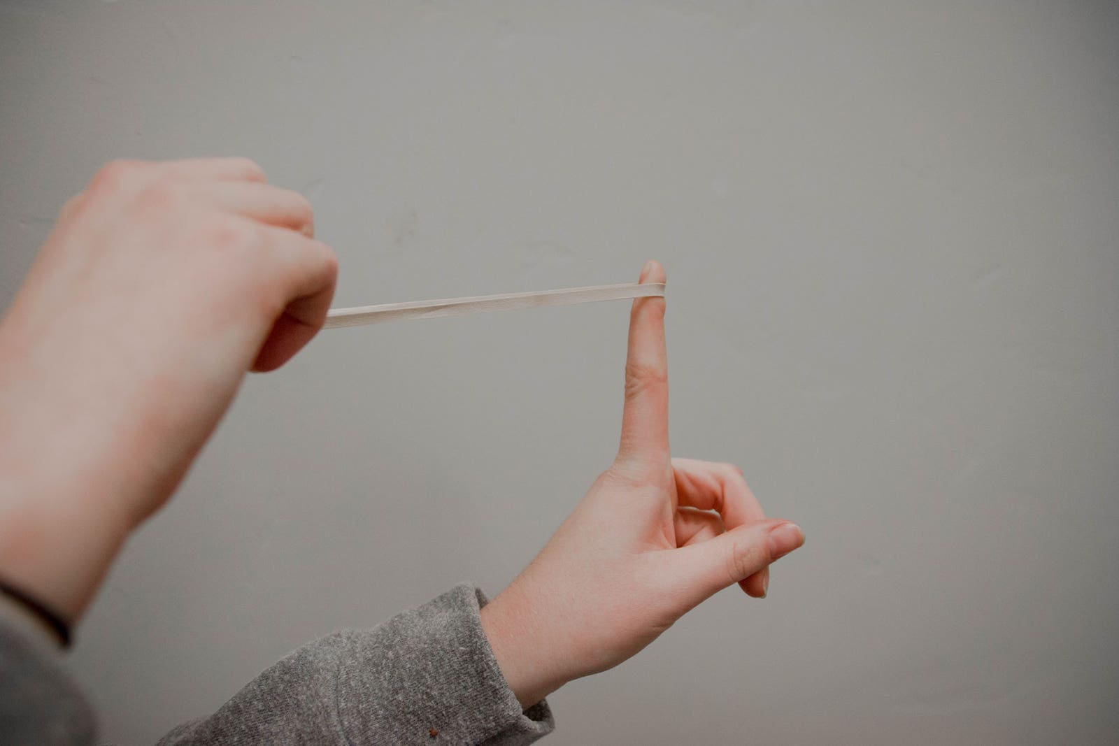 fingers shooting rubber band